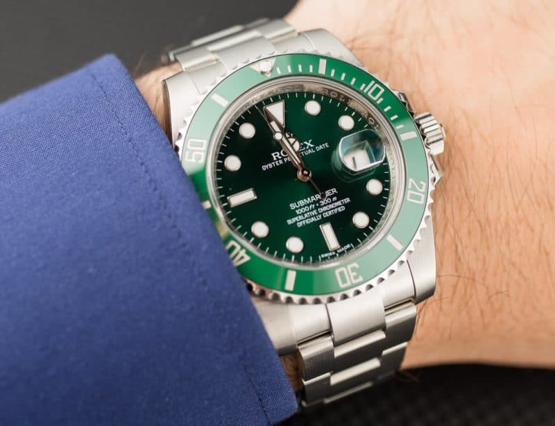 Green Rolex Submariner Date on wristt