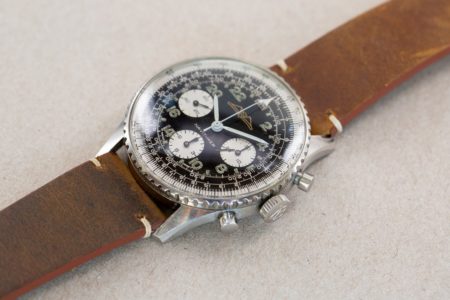 Breitling Navitimer Cosmonaute 809 laying on table-2