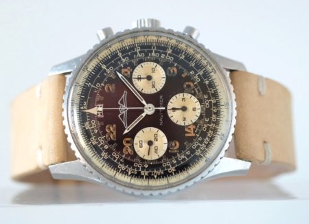 Breitling Navitimer Cosmonaute 809 laying on table